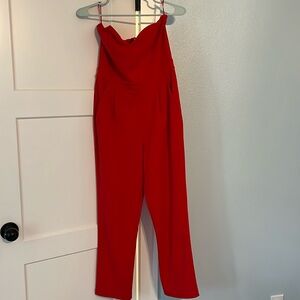 Express red jumpsuit. Strapless heart neck line.